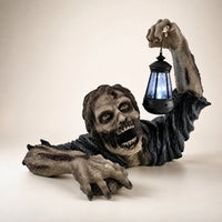 Crawling zombie with LED lantern